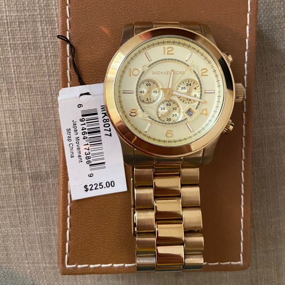 Michael Kors gold oversized watch
